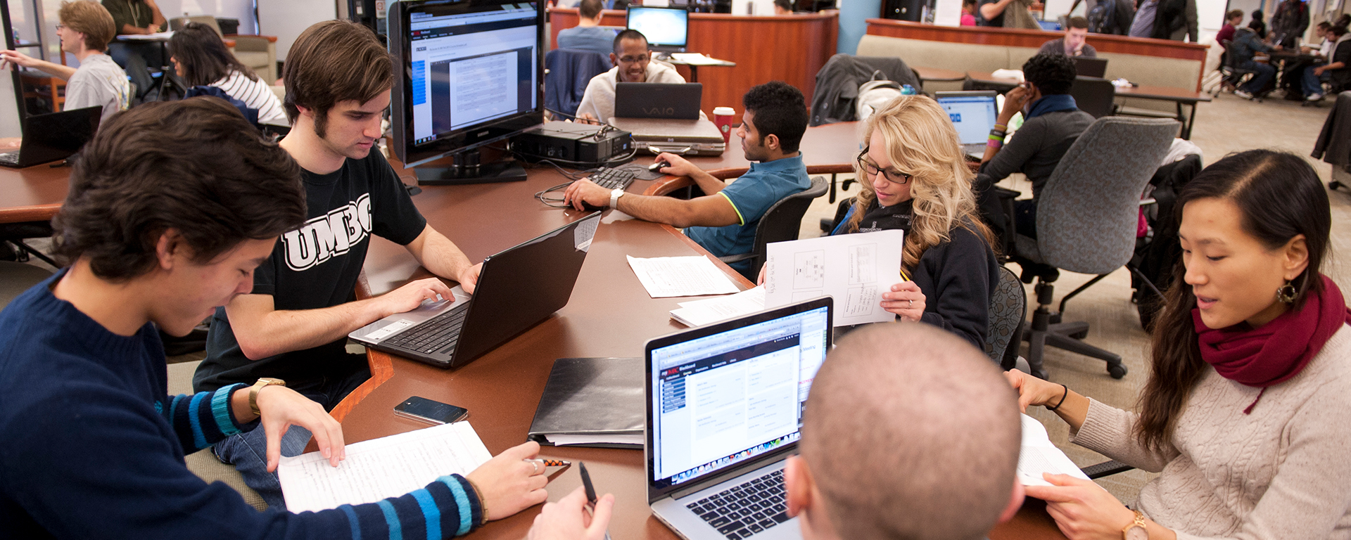 students in classroom looking at computer screens