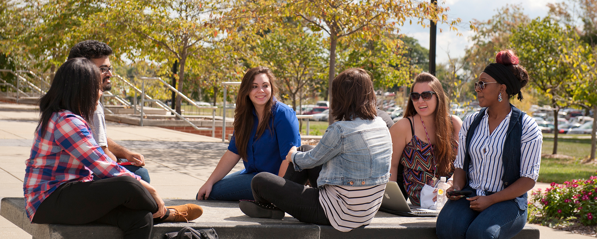 students outside talking