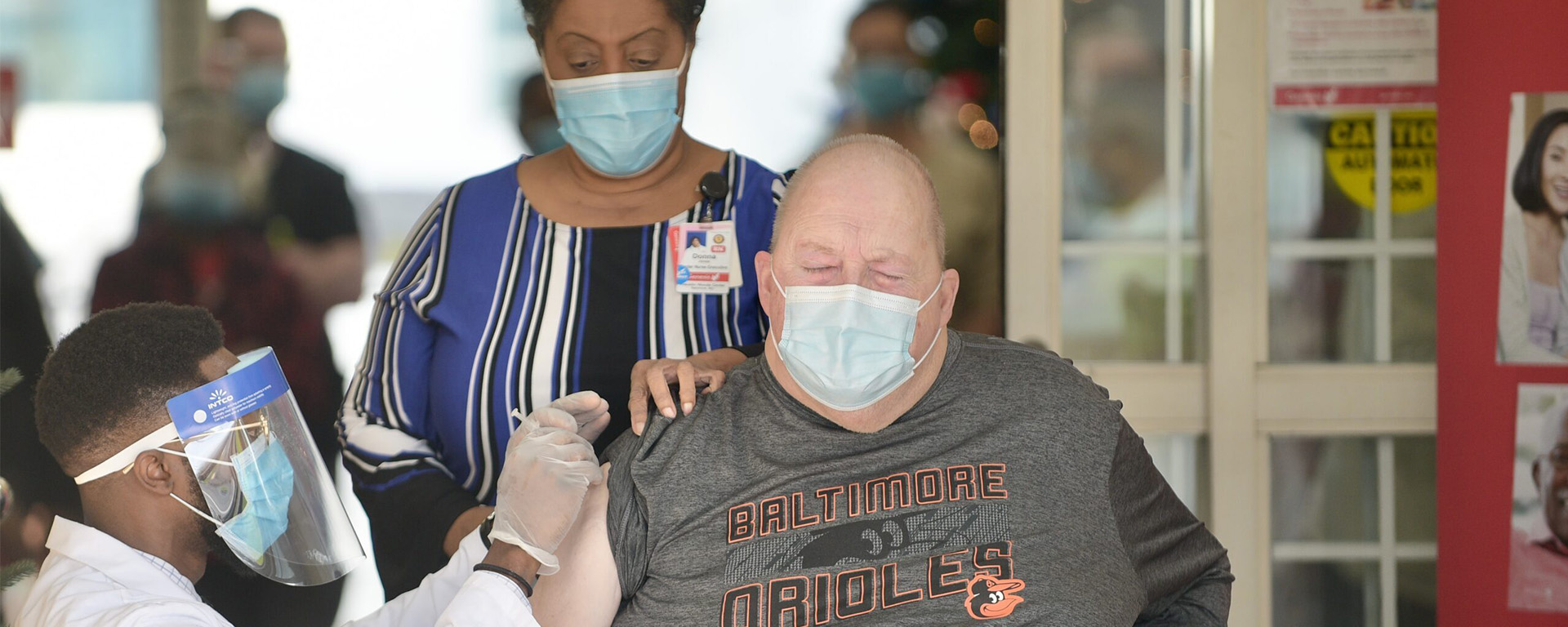 nursing home resident receiving COVID-19 vaccine in 2020