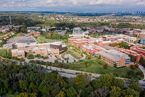 Aerial view of UMBC campus and Baltimore skyline.