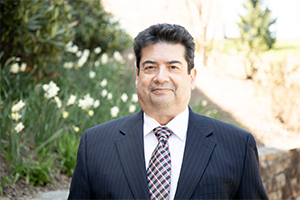 Headshot photo of Augusto Casas